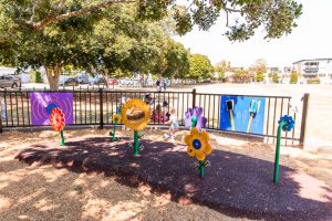 Bulimba Memorial Park playground flowers and fence