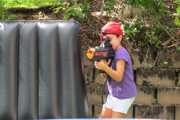 Laser Tag in a Box girl taking aim.