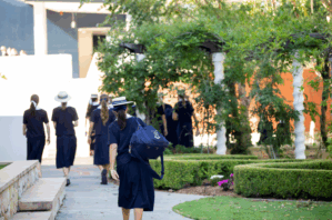 St Margaret's students walking across school grounds.
