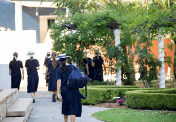 St Margaret's students walking across school grounds.