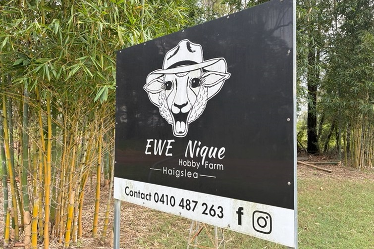 EWE Nique Hobby Farm entry sign.