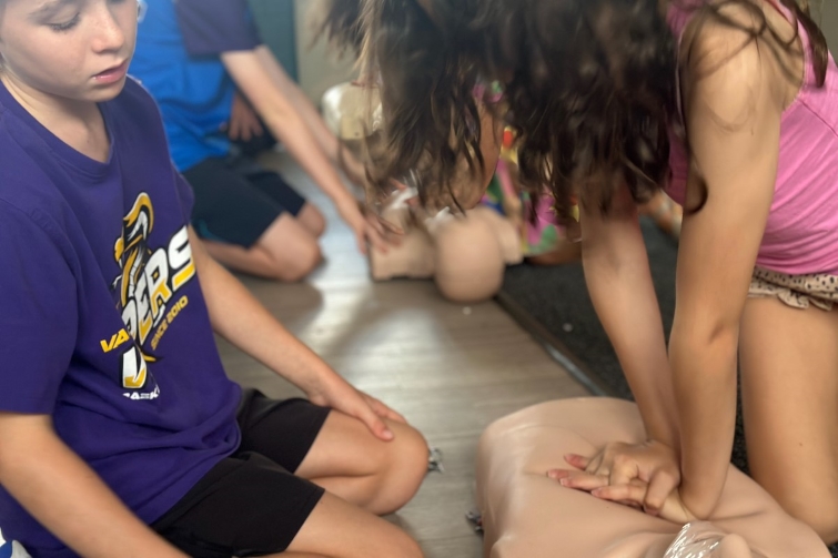 Mr Paramedic children learning cpr.