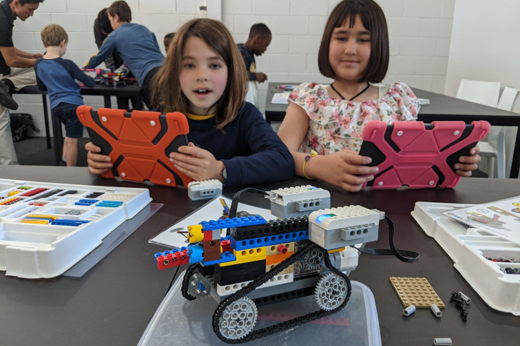 Young Engineers Brisbane students with LEGO robotic car.