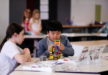 Young Engineers Brisbane students with LEGO robotics.