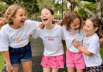 Lemonade Kids laughing group of children.