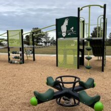 four way seesaw and play equipment at Grandview Place Park.