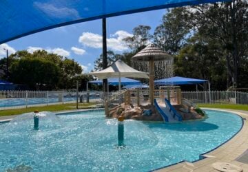 Toddler water play area under shade sail at Hibiscus Sports Complex Pool.