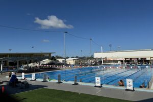 Outdoor swimming pool with lane ropes in place at Clem Jones Aquatic Centre.