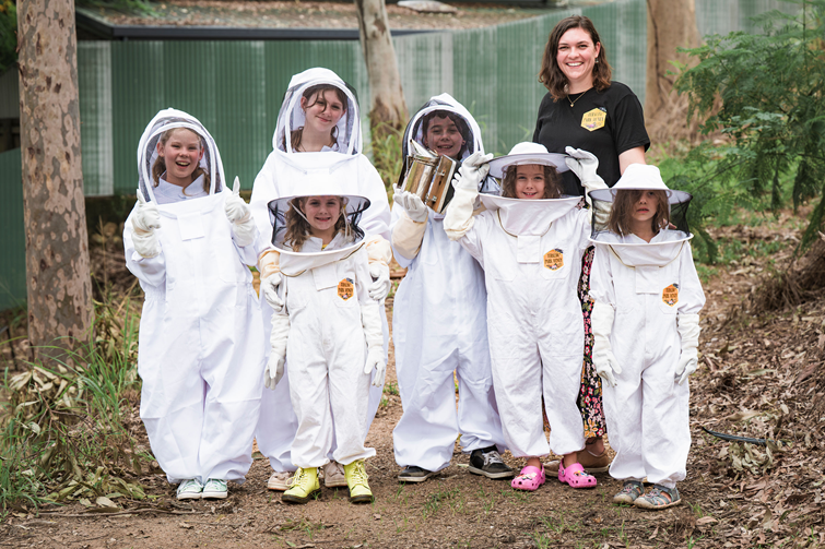 group of students in a bee education group. 