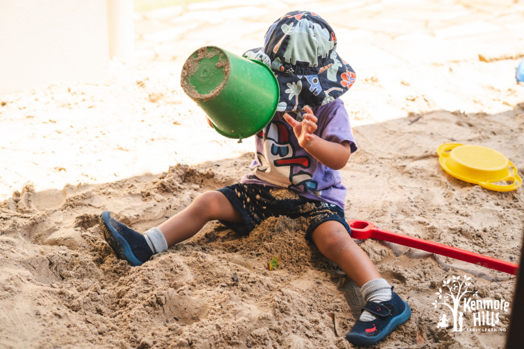 Kenmore Hills Early Learning child in sandpit.