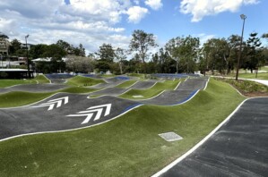 a bmx track on a grassy hill