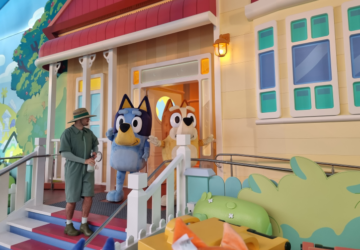 Bluey's World review August 2025 Bluey's house verandah with Bluey and Bingo.