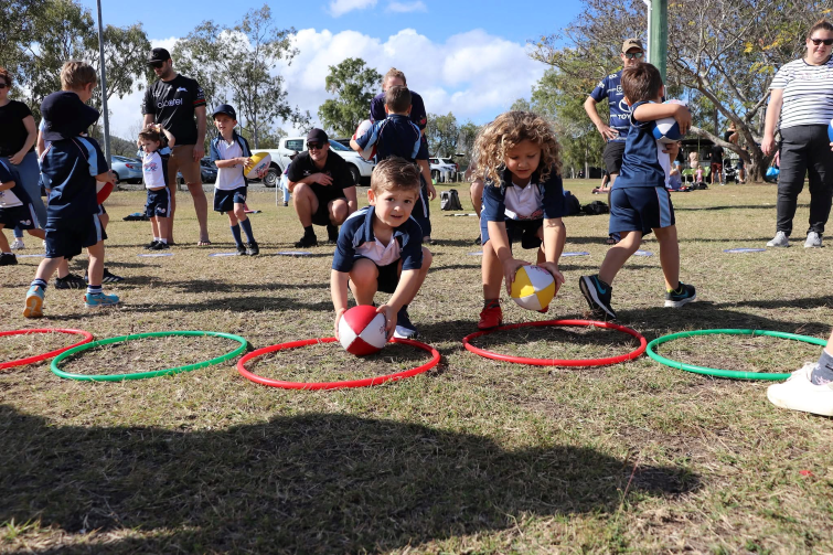 Rugbytots Brisbane young children practicing skills.