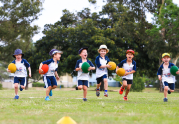 Rugbytots Brisbane young children running with rugby balls.
