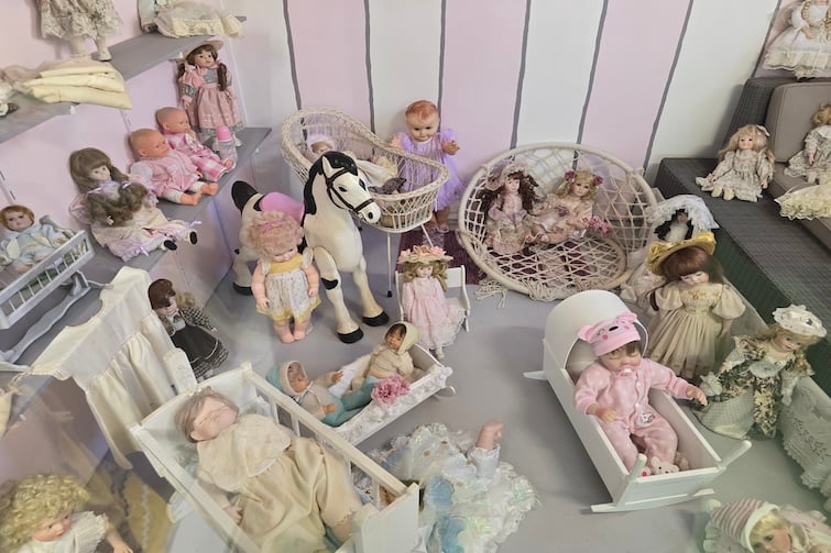 Doll display in the doll museum at Sunshine Castle.