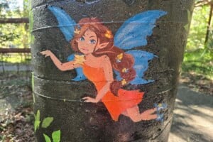 Painting of fairy on a pole at Kumbartcho Sanctuary.