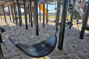 Hammock underneath the play equipment at Pelican Park.
