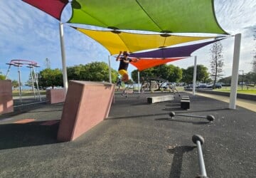 Boy leaping off wall at Redcliffe Parkour Park.