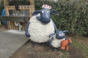 Shaun the sheep characters near a sink at Paradise Country.