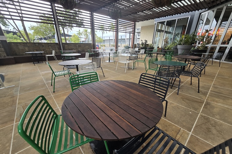 Seating area adjacent to play area at Westfield North Lakes play area.