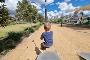 Boy on flying fox at Flagstone Adventure Playground.