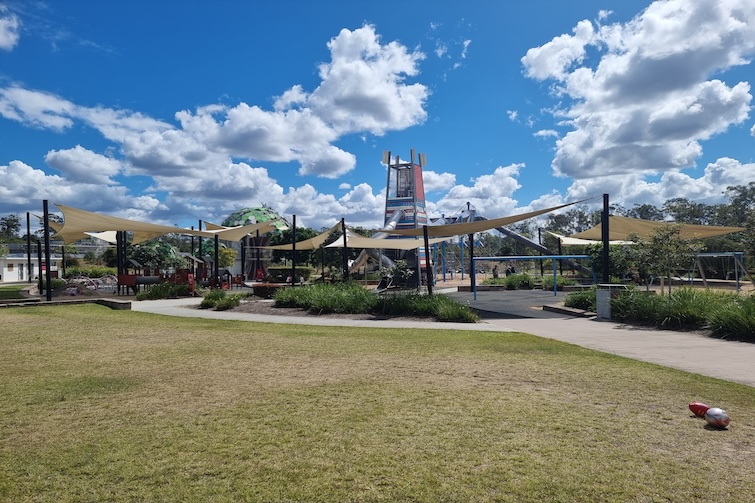 Grassed area beside Flagstone Adventure Playground.