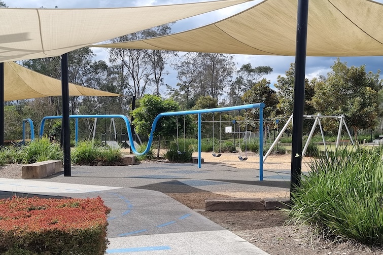 Bank of swings at Flagstone Adventure Playground.