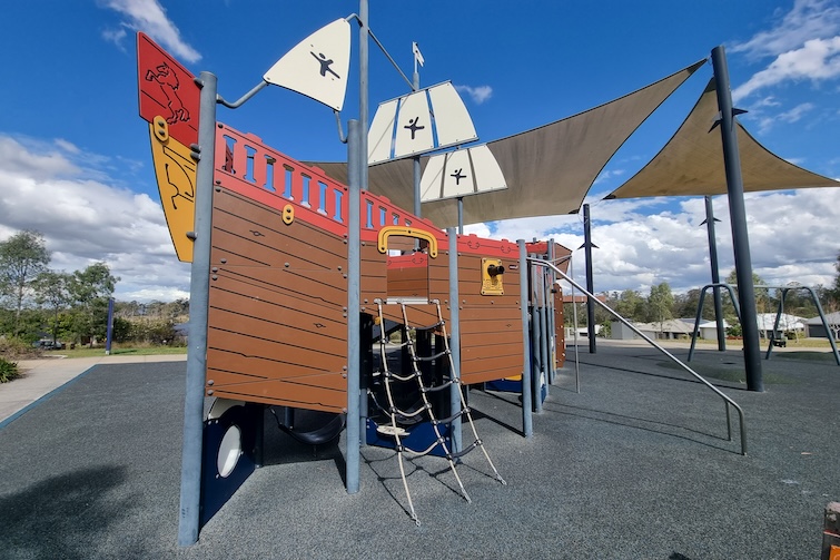 Pirate ship fort and climbing net at Flagstone Pirate Park.