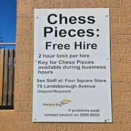 Chess pieces for hire sign near Scarborough Beach Park.