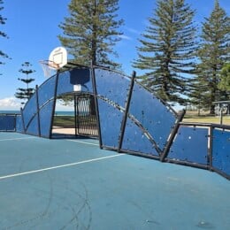 Basketball half court next to Scarborough Beach Park.