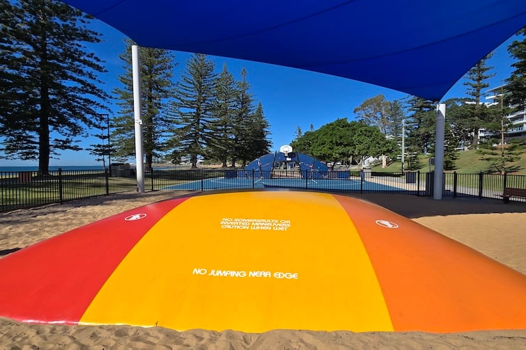Inflatable jumping pillow next to Scarborough Beach Park.