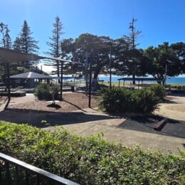 View of fenced playground at Scarborough Beach Park.