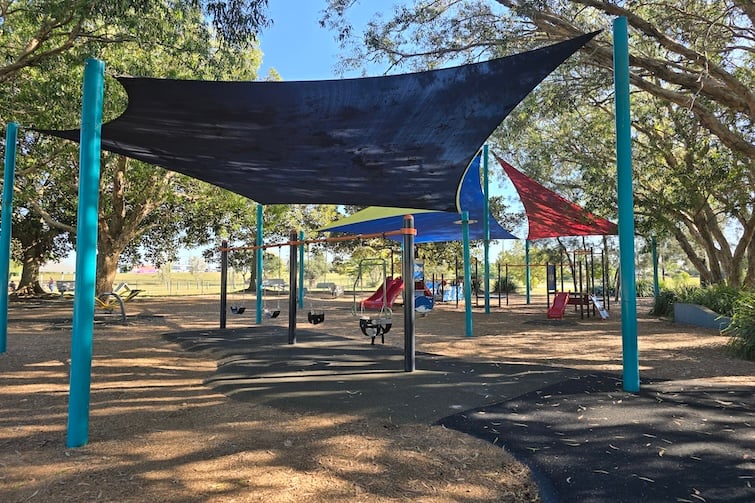 Shade sails and playground at Decker Park.