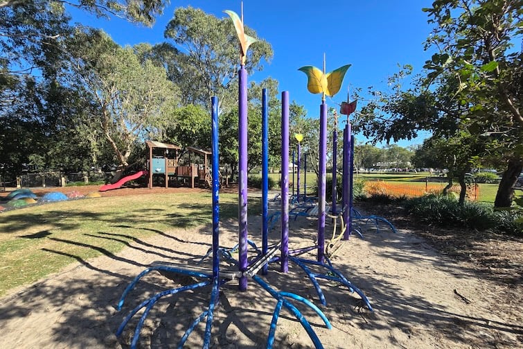 Poles at Einbunpin Lagoon Parklands playground at Sandgate.