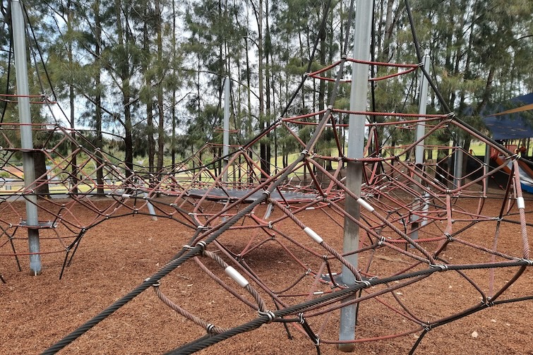 Large climbing net n the playground at Upper Kedron Recreation Reserve.
