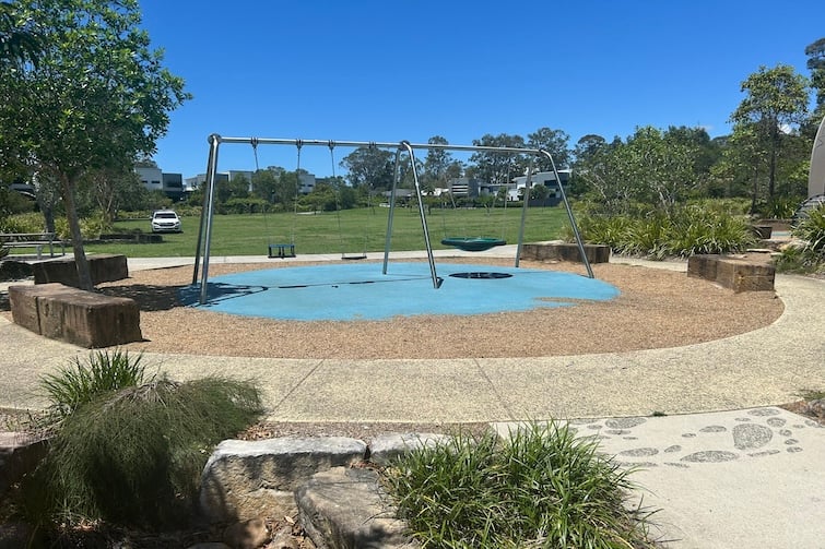 Bank of swings at Eagle Tree Park in Coomera.