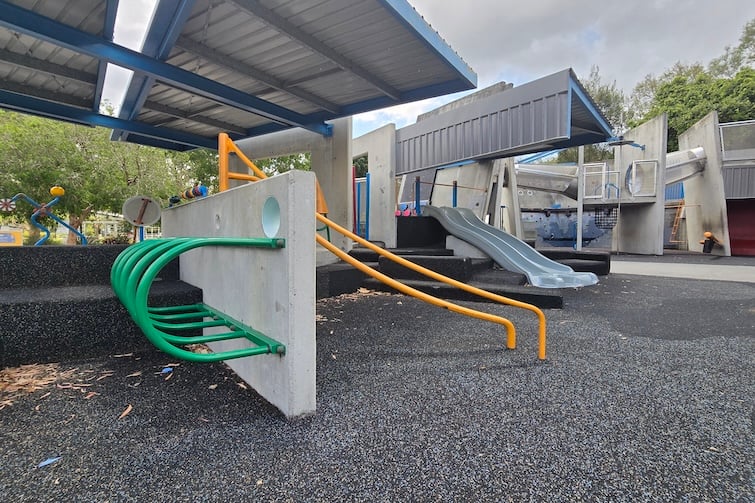Sliding poles and slides at Frew Park.