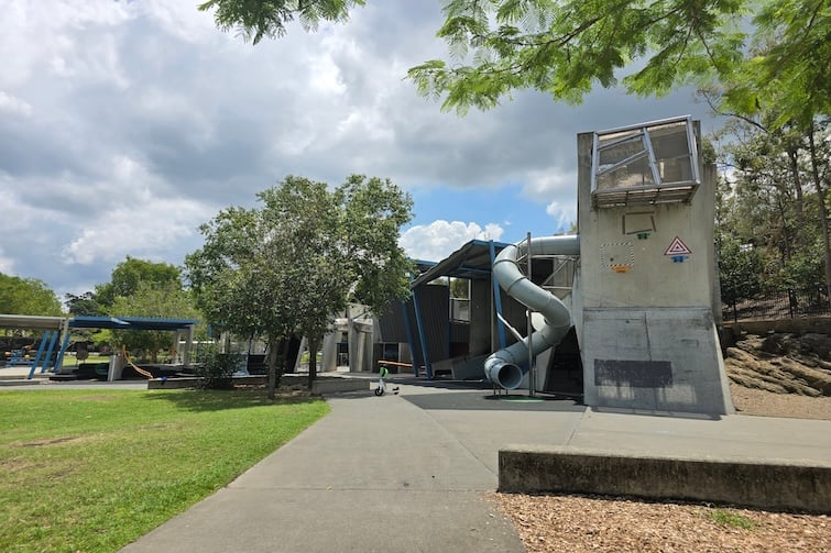 Playground and grass at Frew Park.