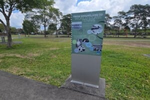Information signs by a path at Frew Park.