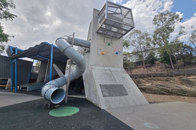 Twisty tunnel slide and hoops at Frew Park.