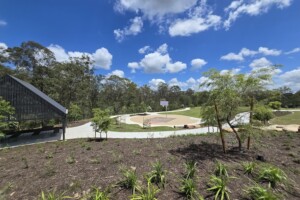 Gardens and basketball half court and shelter at Glider Park in Morayfield.
