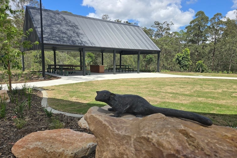 Animal statue on rock at Glider Park in Morayfield.