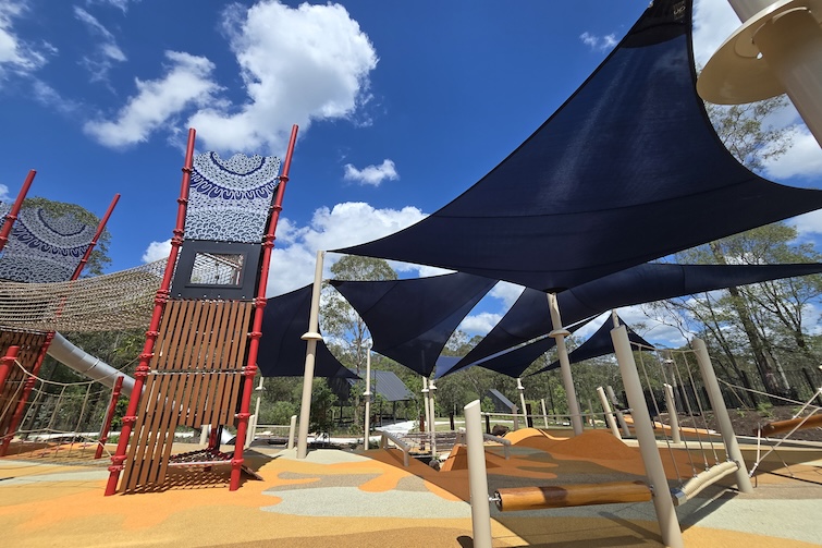 Shade sails and climbing towers at Glider Park in Morayfield.
