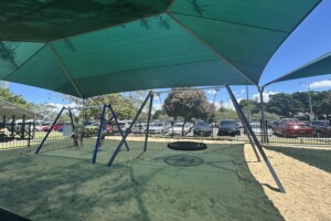 Swings and shade sails at Ian Dipple Lagoon.