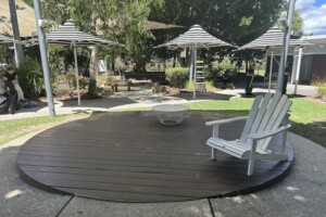 Chair and umbrellas at The Backyard at Westfield Coomera.