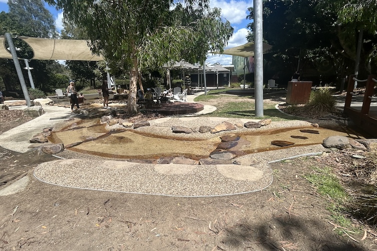 Shallow creek bed at The Backyard at Westfield Coomera.