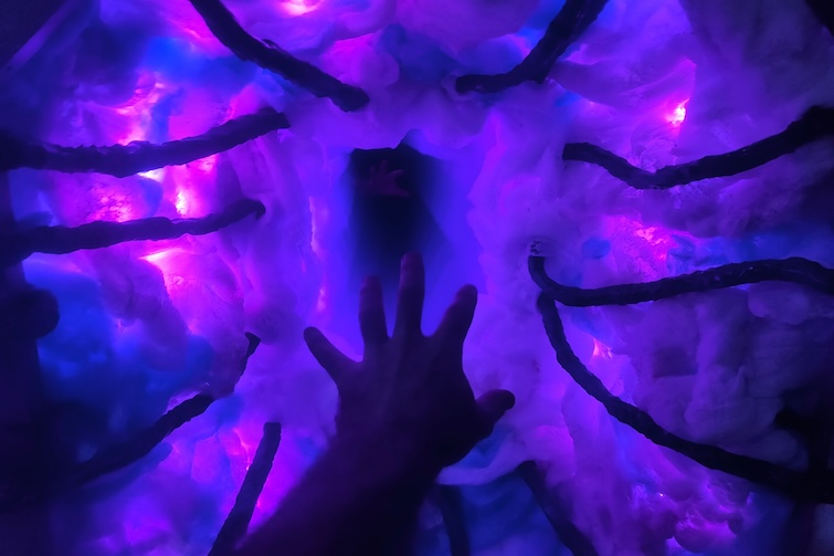 A dimly lit hand at Project Immersive Escape Rooms.