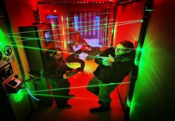 Laser beams and people at Project Immersive Escape Rooms.