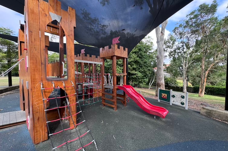 Rope ladder and slide on fort at Majestic Park.