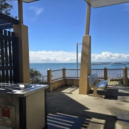 BBQs and chairs with a view to the water at Rotary Park (Amity Playground) in Redcliffe.